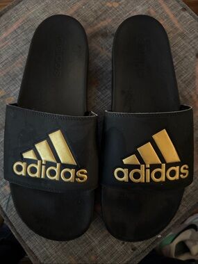 adidas Men’s Black Slides with Gold Logo Accent